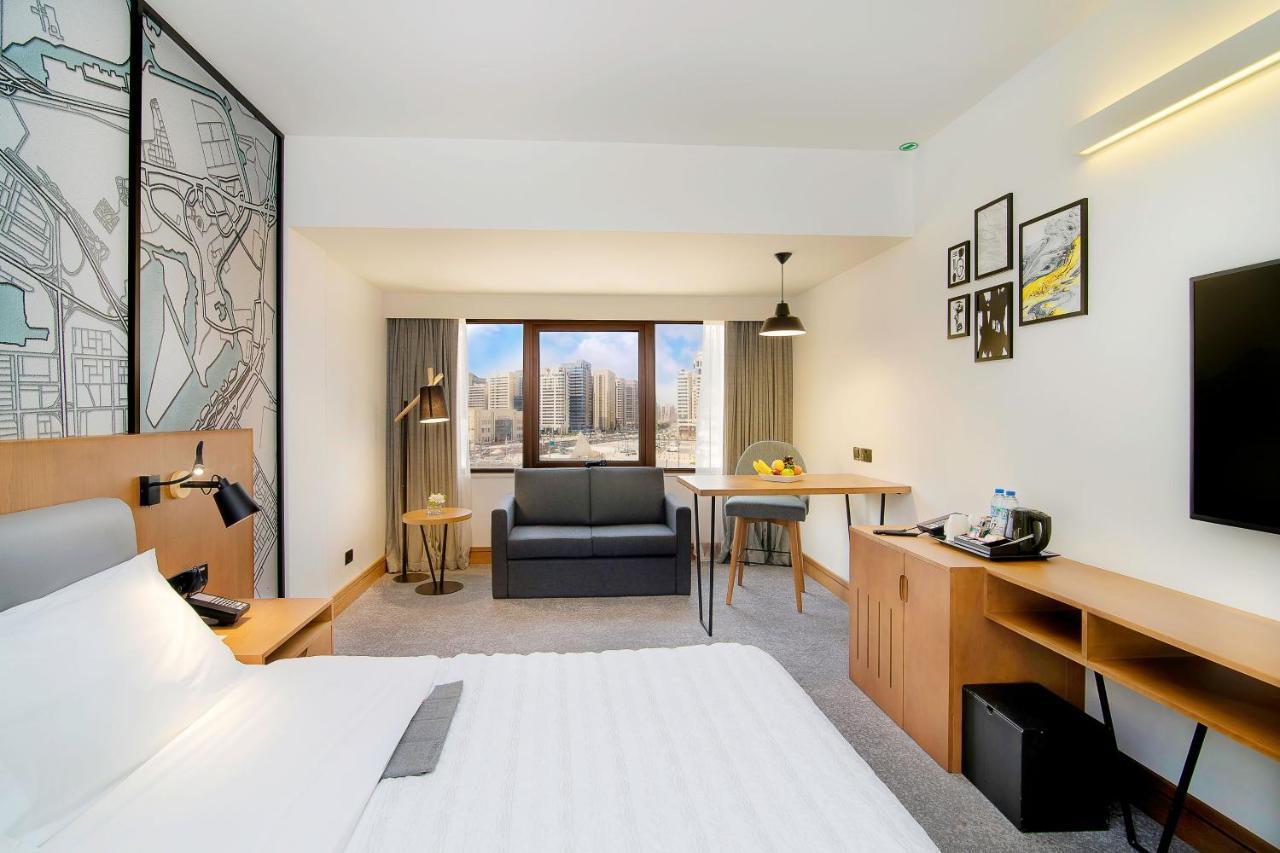 Le Meridien Abu Dhabi Bagian luar foto A typical room at the hotel