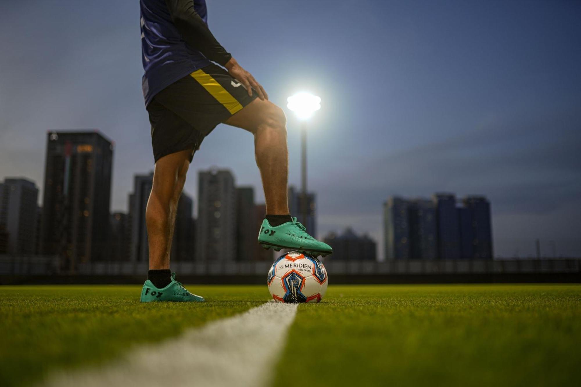 Le Meridien Abu Dhabi Bagian luar foto A player about to kick the ball